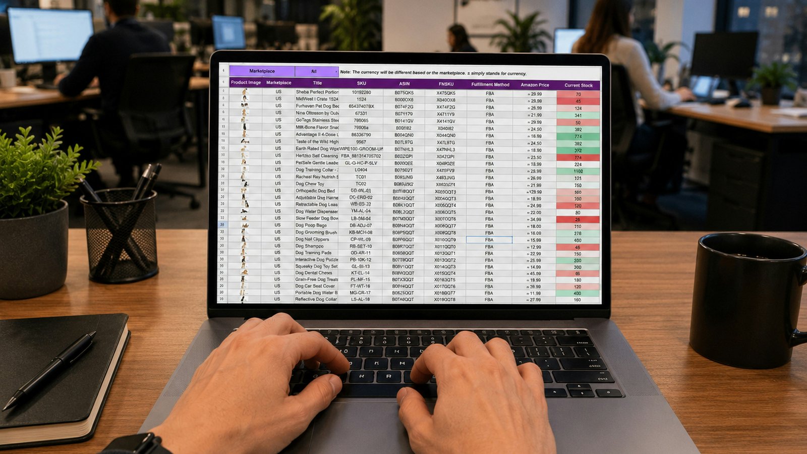 Hands typing on a laptop that shows a data spreadsheet on the screen